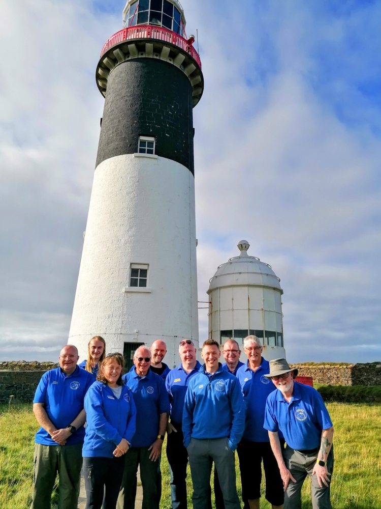 Bushvalley ARC members together outside Rathlin lighthouse during ILLW 2026